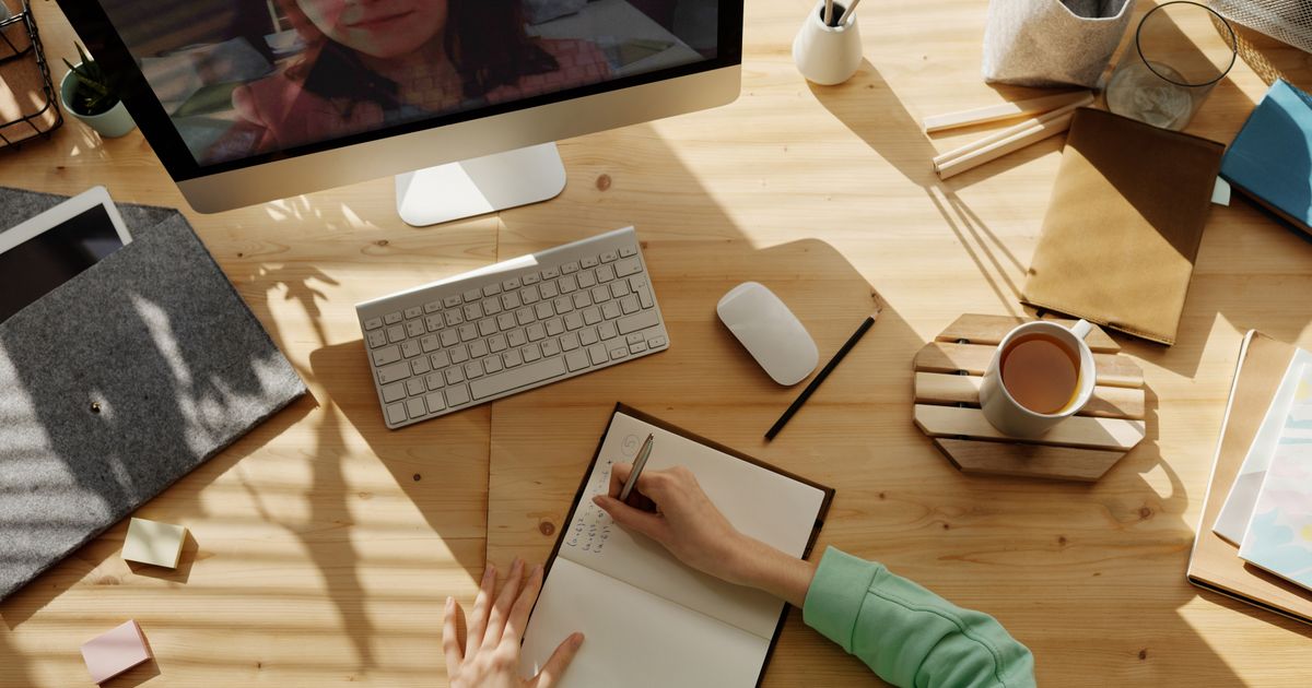 Finding a business email from a LinkedIn profile on a laptop
